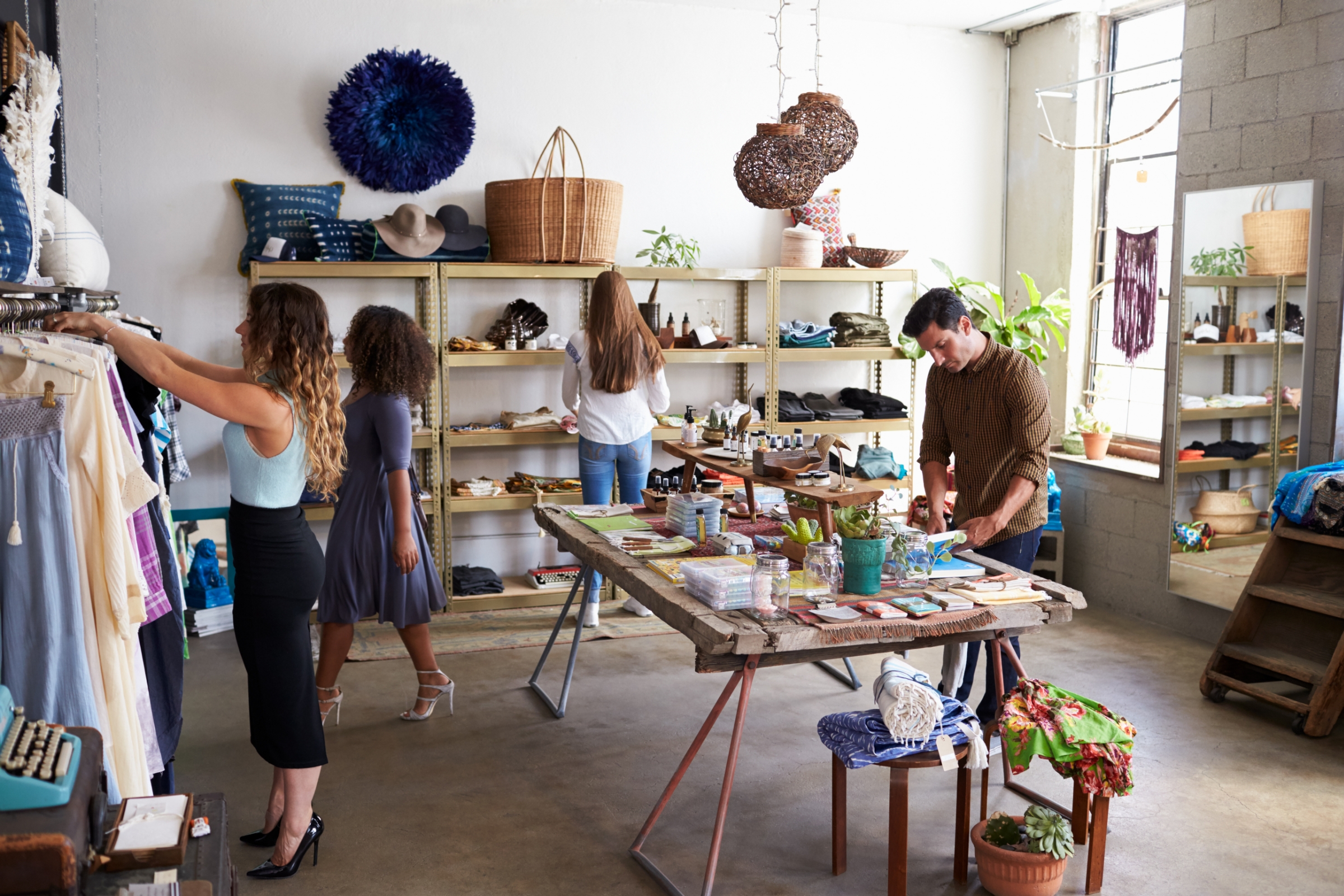 People shopping in a boutique shop.