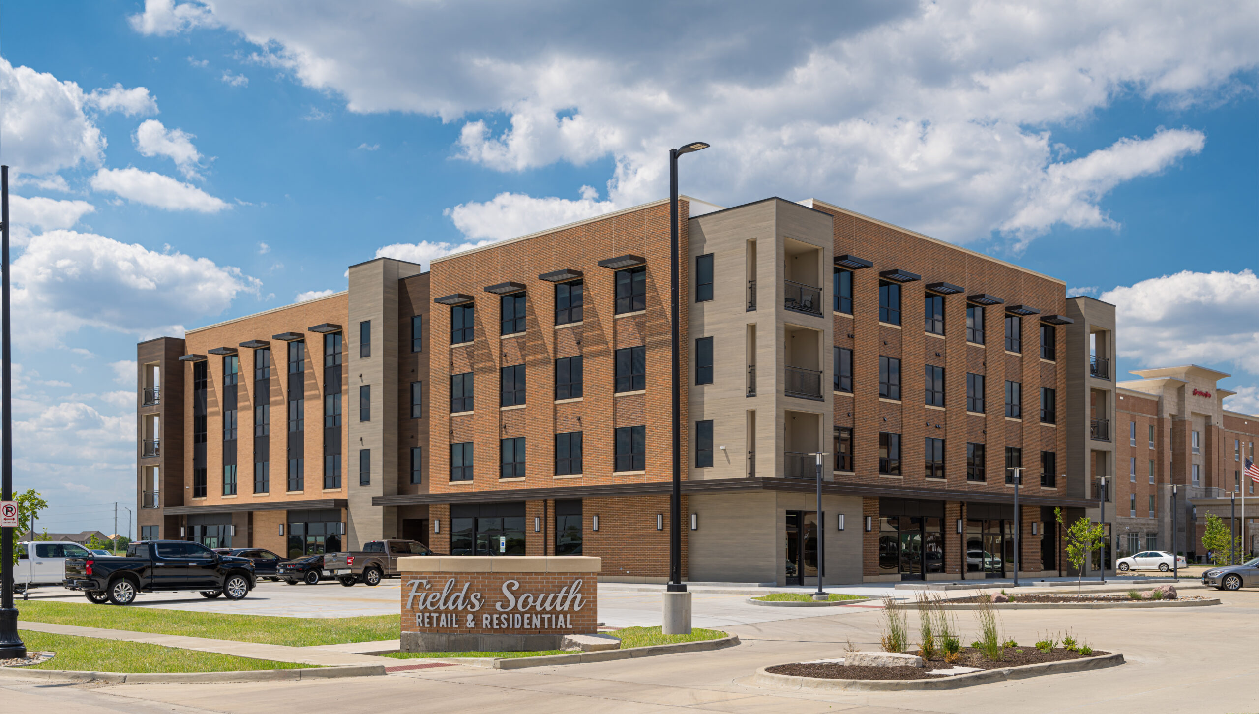 Corner view of a phase two building of Fields South Mixed-Use development.