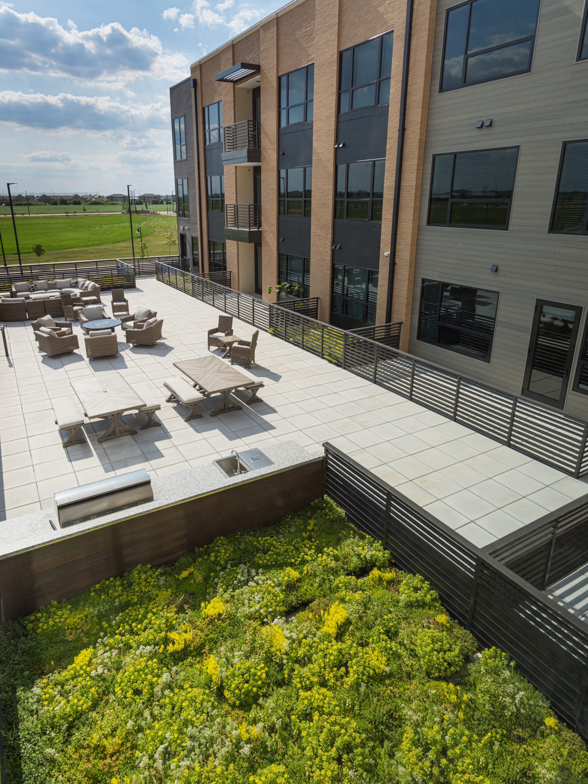 Deck and green roof of Fields South mixed-use development phase 2 building.