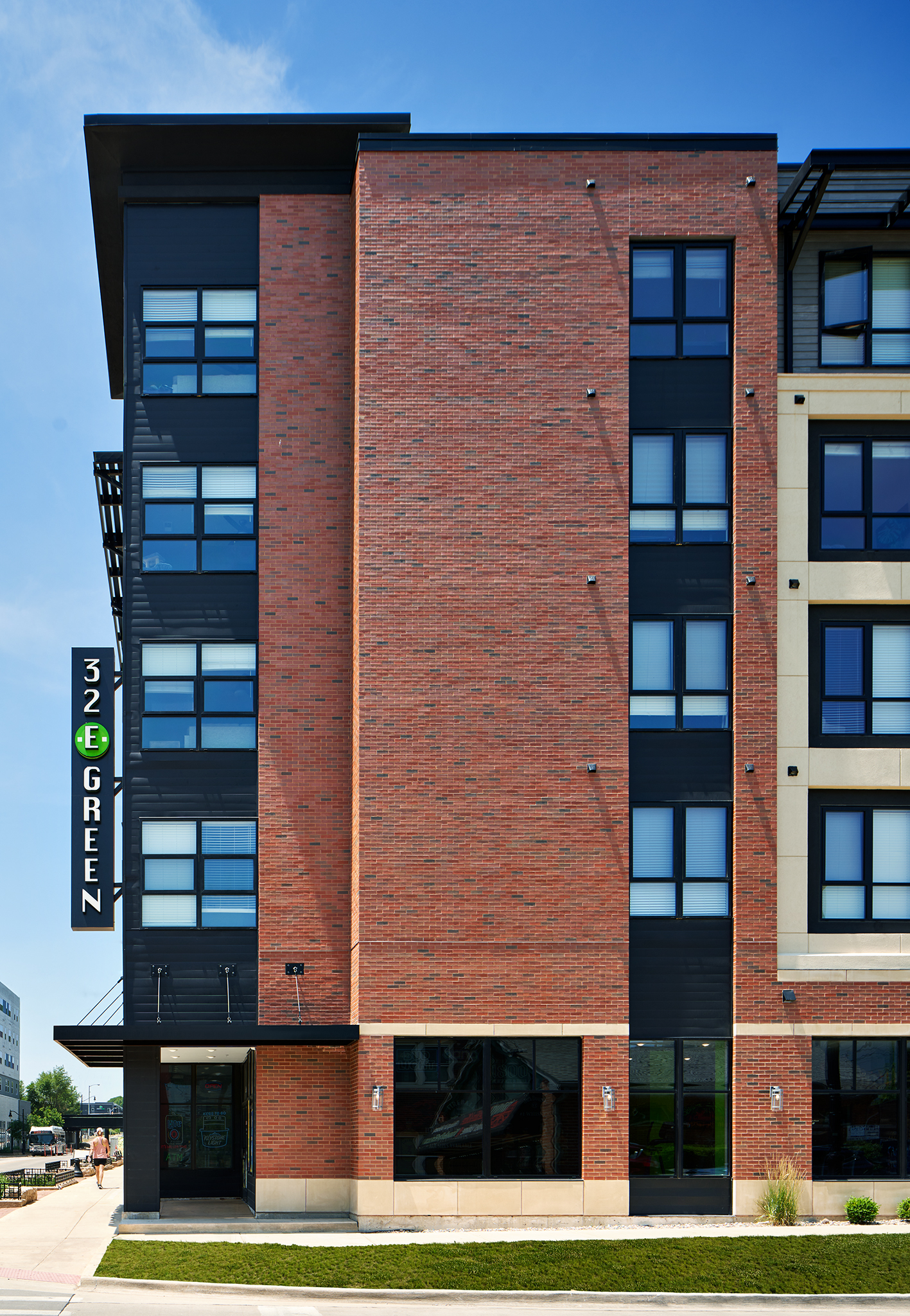 32 E Green Street elevation cropped and showing building signage.