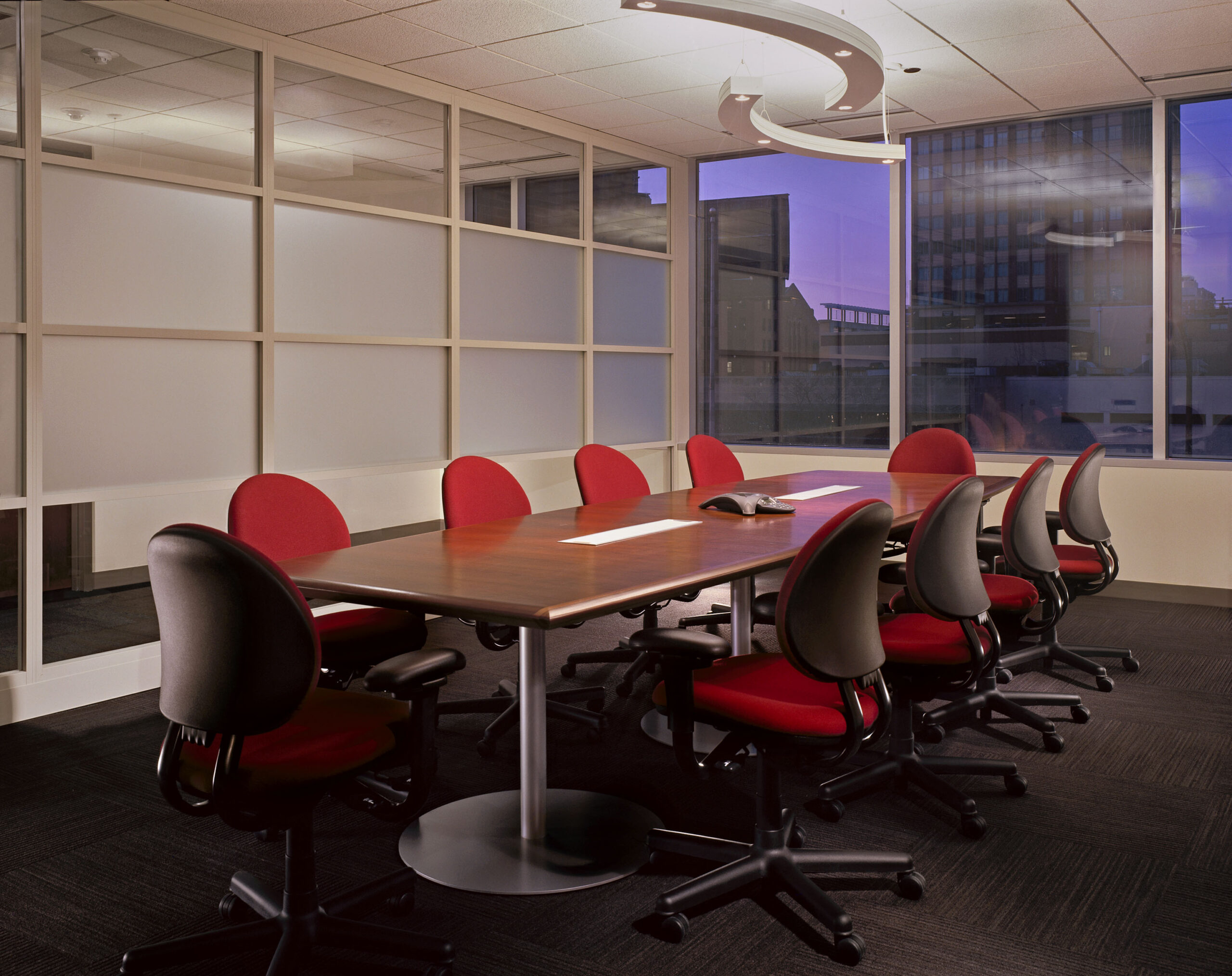 Conference room with round table pedestal in Access Living headquarters building.