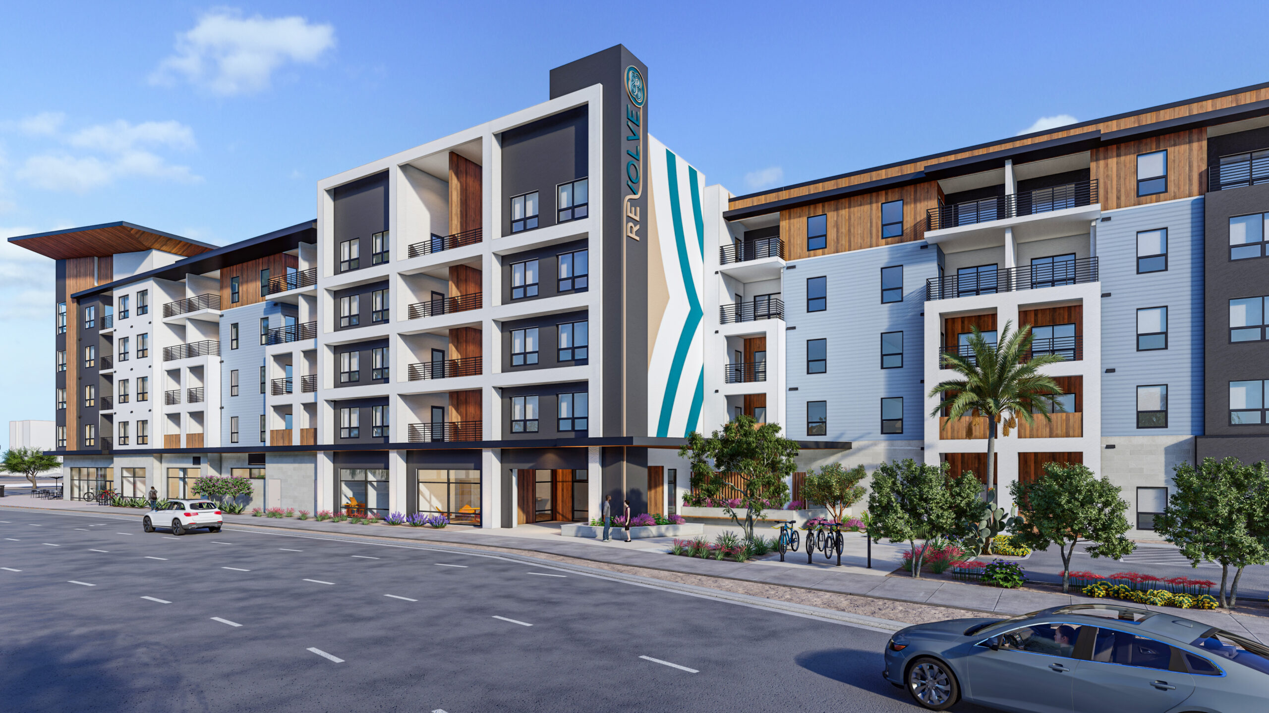 Street perspective rendering of Revolve at P83 multifamily development.