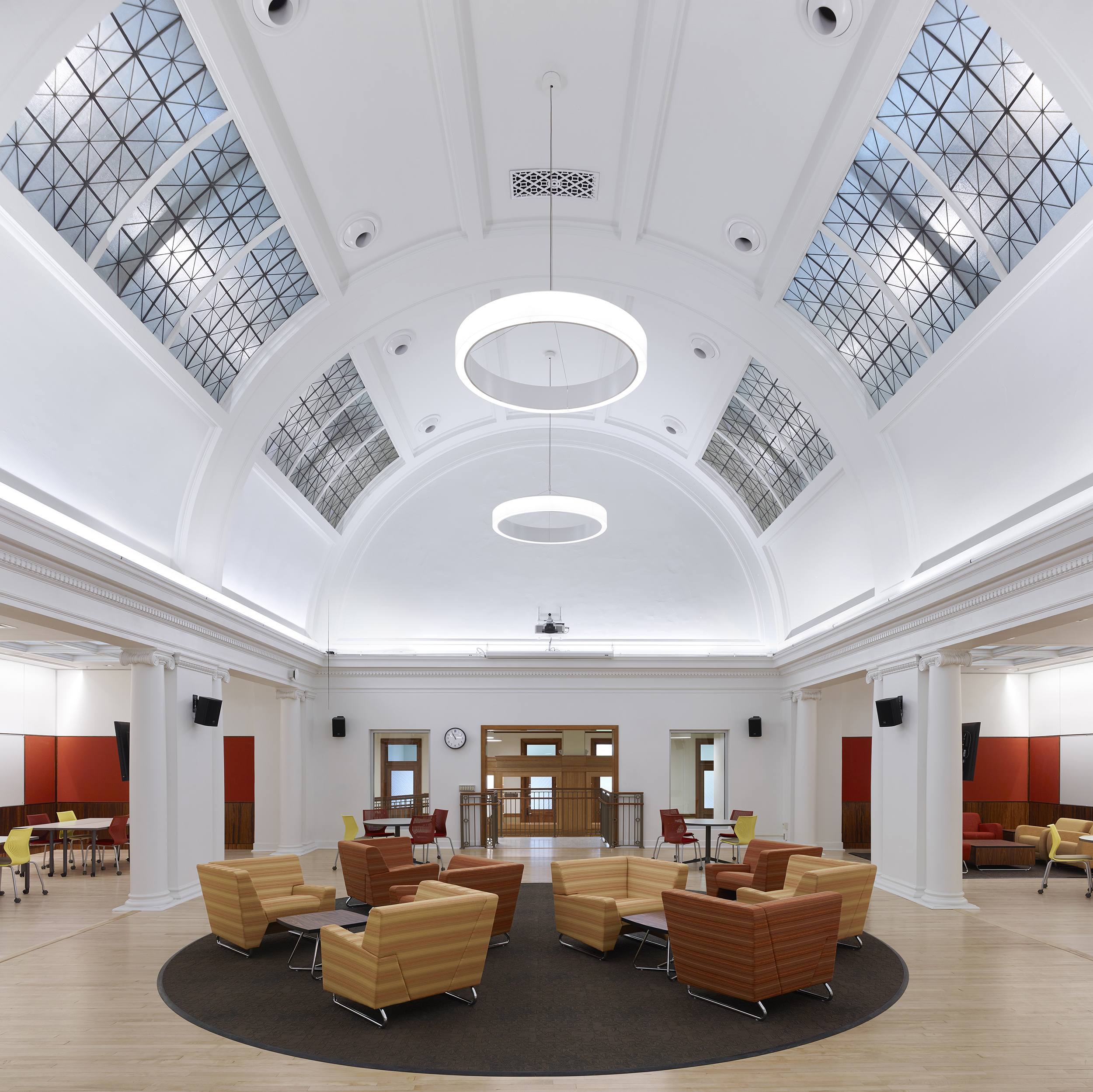 Vaulted lobby space with from 1910s building restored into an informal socializing space.