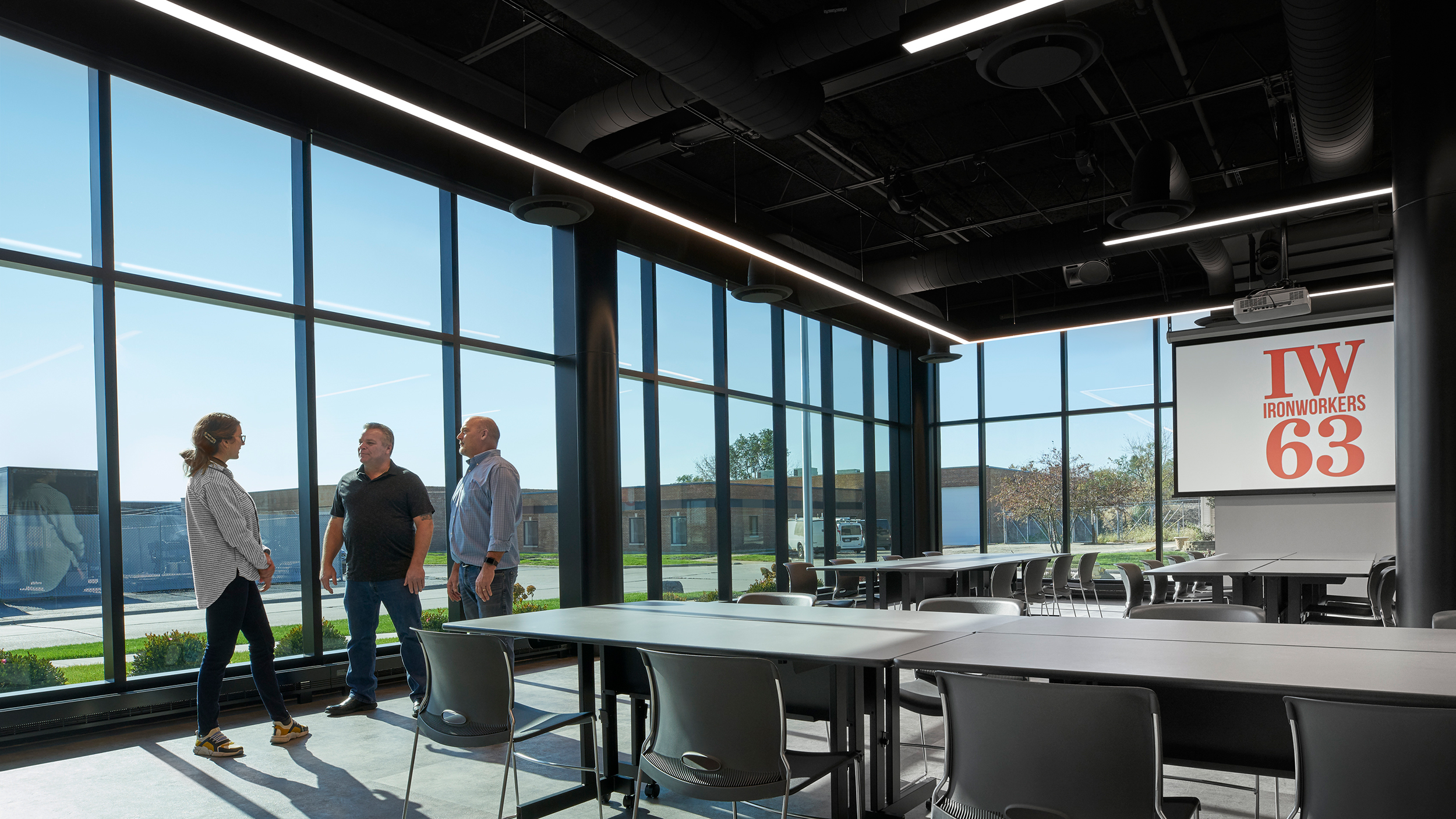 Ironworkers Local 63 classroom with natural light streaming through curtain wall.