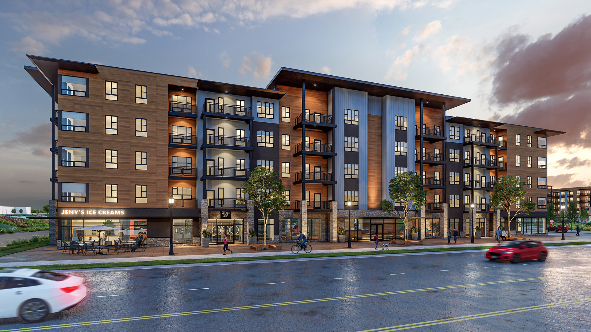 Street view of Revolve at ThornCreek multifamily development at twilight.