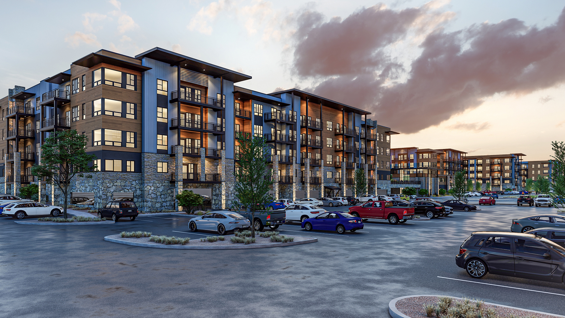 Revolve at ThornCreek exterior sunset view of residential buildings and clubhouse.