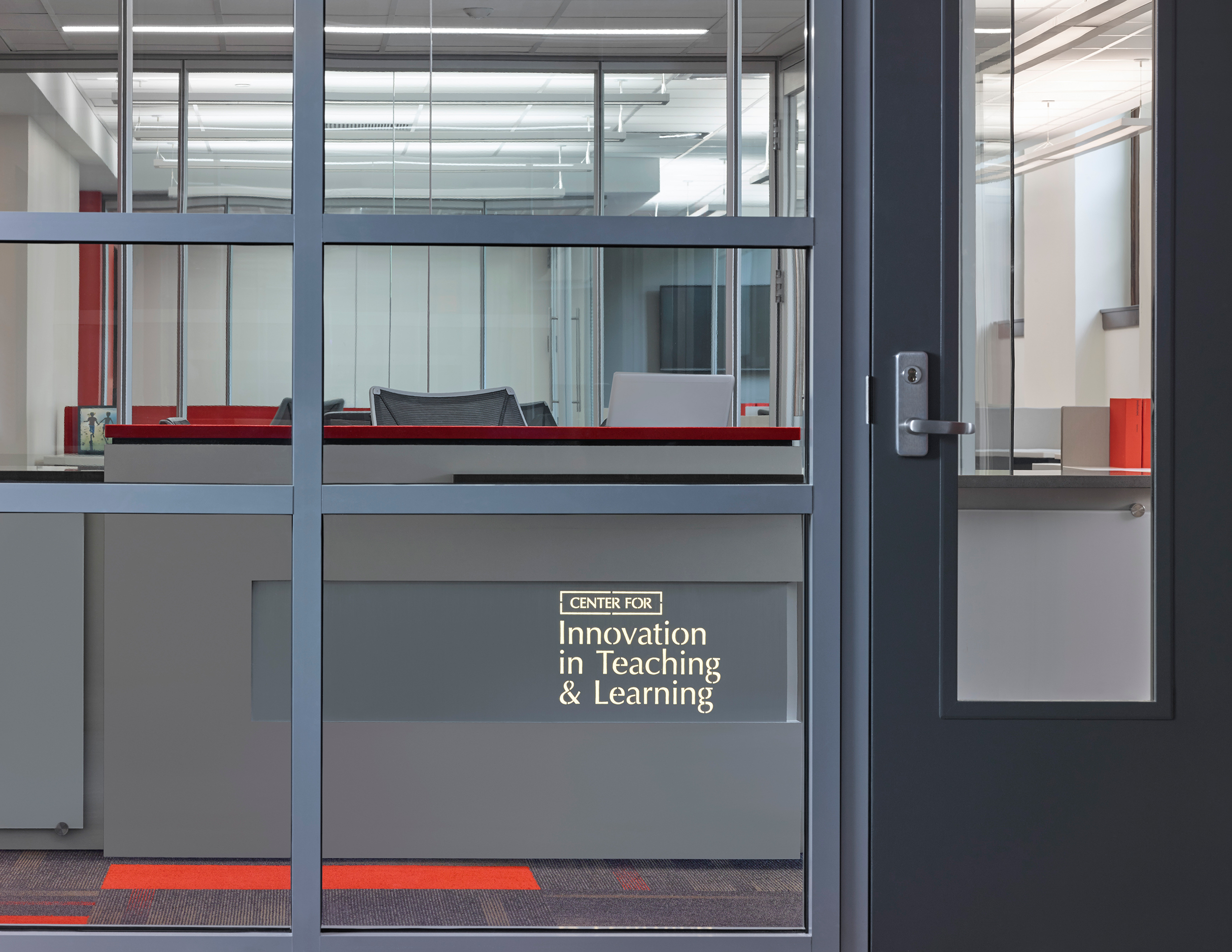 Office suite entrance at CITL with signage.