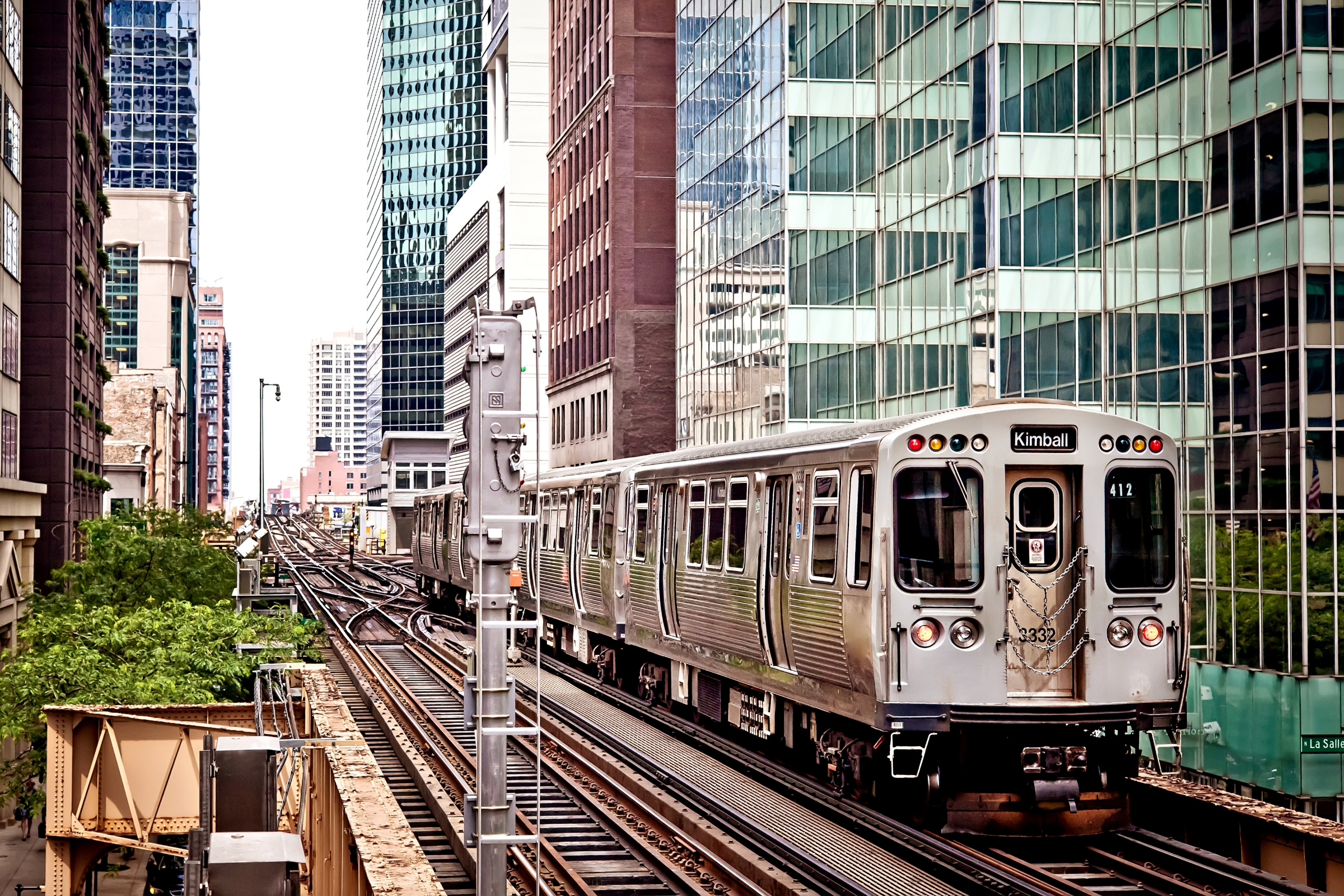 Chicago train passing through high-rise buildings